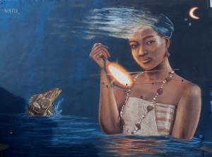 a painting of a woman in the water at Elisa Posada Hotel in Córdoba