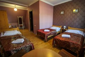 Letto o letti in una camera di Hotel Svaneti