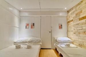 Cama o camas de una habitación en Pallet Homes - Tabuc Suba