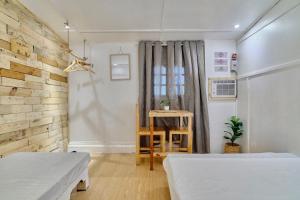 Cama o camas de una habitación en Pallet Homes - Tabuc Suba