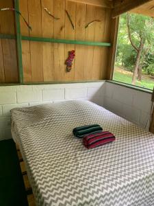 Voodi või voodid majutusasutuse Cabañas Casa Soley toas