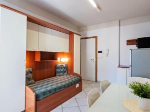 a bedroom with a bed in a room at Modern Apartment in Rimini with Balcony in Rimini