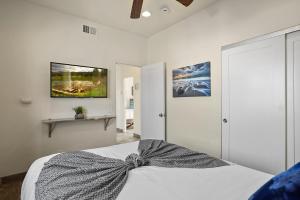 a bedroom with a bed with a bow on it at Ocean View Paradise w Private Patio & Spa in San Diego