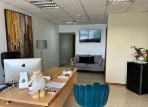 TV a/nebo společenská místnost v ubytování Alquiler Oficina cooperativa