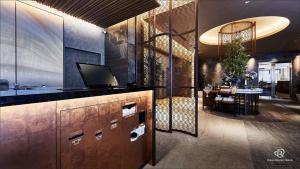 a kitchen with a dining room with a table at Daiwa Roynet Hotel Osaka Sakaisuji Honmachi PREMIER in Osaka