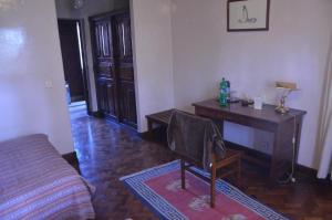 Voodi või voodid majutusasutuse Vajra Hotel toas