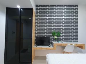 TV a/nebo společenská místnost v ubytování Irich residence South Samrong 6 Kms BTS-Pu Chao