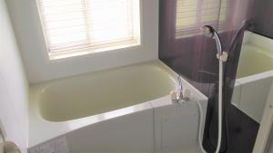 Ένα μπάνιο στο B&BHOUSE FAM - Vacation STAY 39468v