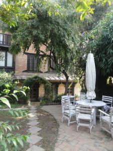 Zahrada ubytování Vajra Hotel