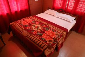Postel nebo postele na pokoji v ubytování SAI HOLIDAY HOME