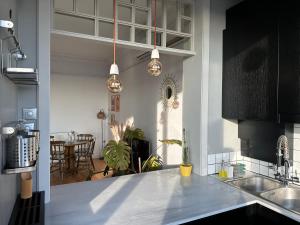 a kitchen with a counter and a dining room at Unbelievable golden horn view in Beyoglu in Istanbul