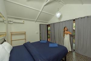 Palm Trees Ayurvedic Heritage客房内的一张或多张床位