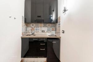 Kuchyňa alebo kuchynka v ubytovaní CASA DI SILVIA a PORTA PIA