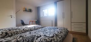 Postel nebo postele na pokoji v ubytování Ferienwohnung Albbruck/Albert