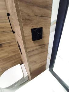 a bathroom with a toilet and a mirror at ***Santorini Apartament*** - 40m² ✓ in Rybnik +41 photos