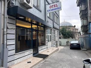 a building with a car parked in front of it at HOTEL KOCABASOGLU in Istanbul