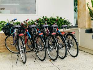 a group of bikes parked next to each other at Orchid Riverside Villa in Hue