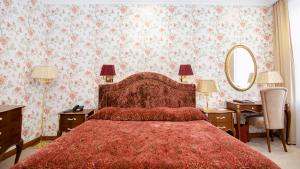 Postel nebo postele na pokoji v ubytování Swiss Hotel + 37 fotografií