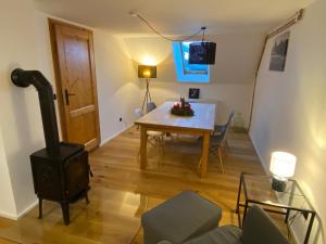 TV a/nebo společenská místnost v ubytování Allgäu Cottage - traumhafter Blick in die Schweizer Berge