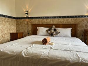 Postel nebo postele na pokoji v ubytování Leo Home Stay