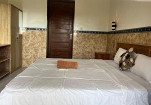 Postel nebo postele na pokoji v ubytování Leo Home Stay