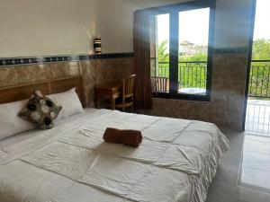Postel nebo postele na pokoji v ubytování Leo Home Stay + 27 fotografií