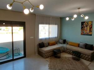 Zona d'estar a top apartment Airport Mohamed 5