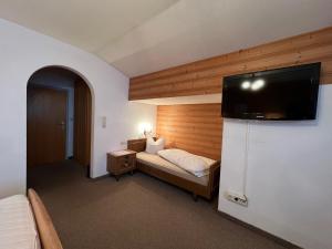 Voodi või voodid majutusasutuse Gästehaus Tauscher am Haldensee toas