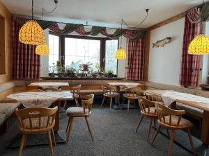 Restoran või mõni muu söögikoht majutusasutuses Gästehaus Tauscher am Haldensee