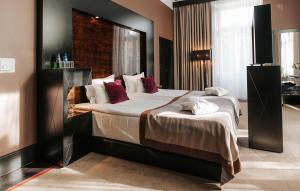 Posteľ alebo postele v izbe v ubytovaní Platinum Palace Boutique Hotel & SPA