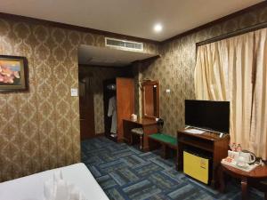 TV a/nebo společenská místnost v ubytování Soubundith Hotel