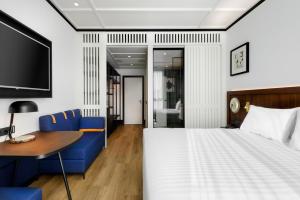 Postel nebo postele na pokoji v ubytování Hotel Tres Reyes San Sebastián
