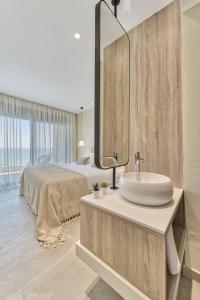 Koupelna v ubytování Sabbia D`oro Beach Villa