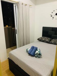 Krevet ili kreveti u jedinici u objektu Laureano Trevi Residences Makati Suites Condotel