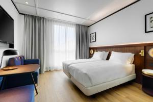 Postel nebo postele na pokoji v ubytování Hotel Tres Reyes San Sebastián