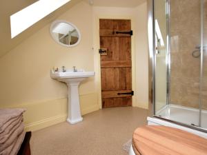 a bathroom with a sink and a shower at 2 Bed in Newthorpe 47032 