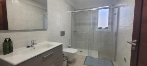 Koupelna v ubytování Sabbia Suites Blue + 37 fotografií