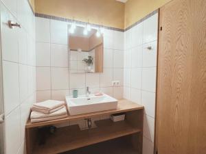 Vannituba majutusasutuses Appartements Skida +14 fotot