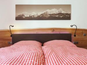 Voodi või voodid majutusasutuse Appartements Skida toas