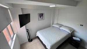 TV/trung tâm giải trí tại Pearl 23