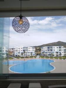 Bazén v ubytování MIRADOR GOLF 2 Apt B15 nebo v jeho okolí