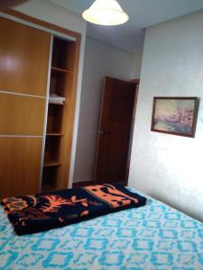 Postel nebo postele na pokoji v ubytování MIRADOR GOLF 2 Apt B15