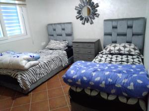 Postel nebo postele na pokoji v ubytování MIRADOR GOLF 2 Apt B15