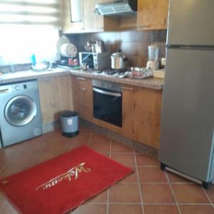 Kuchyň nebo kuchyňský kout v ubytování MIRADOR GOLF 2 Apt B15