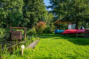 a park with a playground with a water slide at Ferienhaus Paula in Leipe