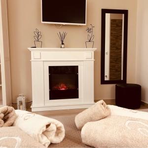 Ένα ή περισσότερα κρεβάτια σε δωμάτιο στο Il tempo di un Caffè