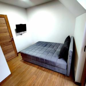 Postel nebo postele na pokoji v ubytování Borovi 2, apartman 8 + 5 fotografií