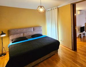 Ein Bett oder Betten in einem Zimmer der Unterkunft Beautiful Apartment, Close to Beach