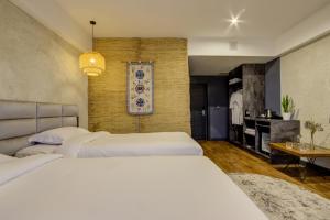 Olimp Hotel客房内的一张或多张床位