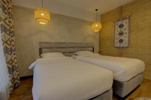 Olimp Hotel客房内的一张或多张床位